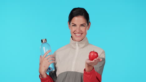 Health,-face-and-woman-with-an-apple-on-a-blue