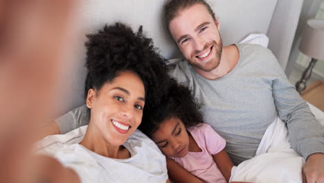 Face,-interracial-parents-and-selfie-of-child