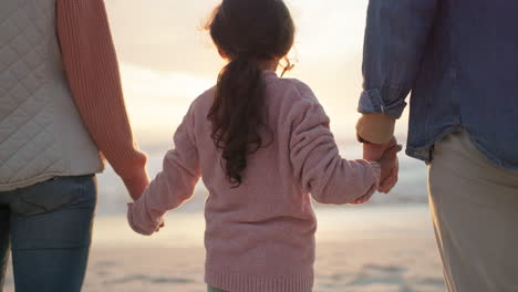 Back,-beach-and-family-holding-hands