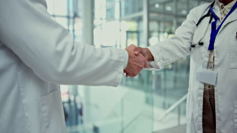 Doctor,-handshake-and-greeting-in-meeting