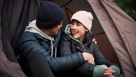 Tent,-hug-and-a-couple-outdoor-for-camping