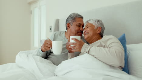 Couple,-coffee-and-kiss-in-bedroom-for-love