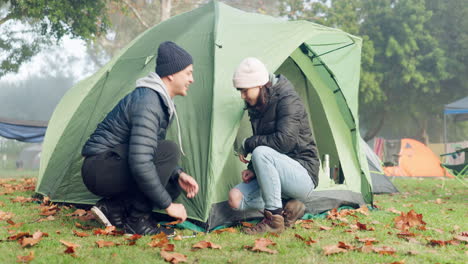 Camping,-tent-and-help-with-couple