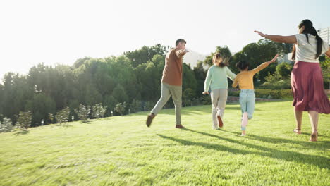 Family,-running-and-children-outdoor-at-a-park