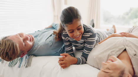 Happy-family,-bed-and-kid-playing-in-a-bedroom