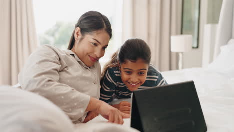 Happy,-tablet-and-mother-with-daughter-in-bedroom