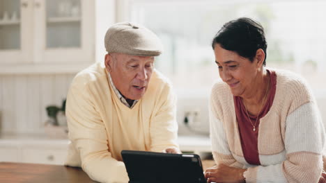 Tablet,-internet-and-senior-couple-talking