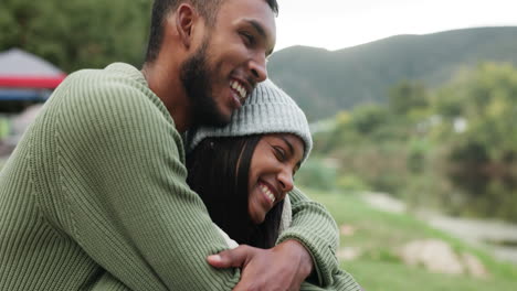 Couple,-hug-and-happiness-at-camp-in-nature