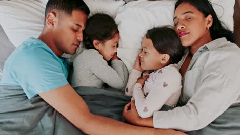 Children,-sleeping-and-parents-in-bed-in-top-view