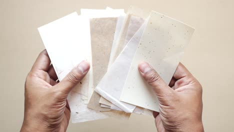 Men-hand-on-craft-paper-close-up