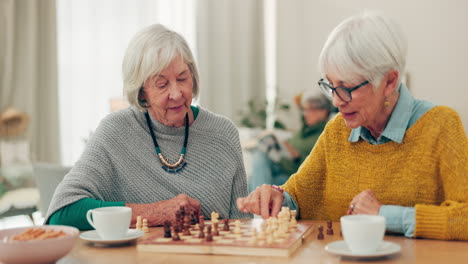Senior-woman,-friends-and-playing-chess-on-table