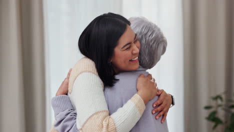 Greeting,-hug-and-mother-and-daughter-in-house