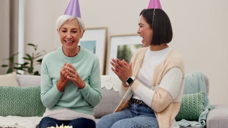 Birthday,-party-and-cake-with-a-senior-woman