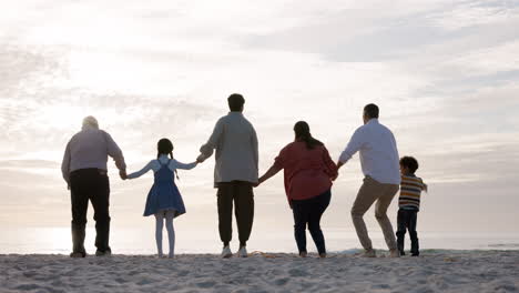 Family,-jump-and-holding-hands-at-the-beach