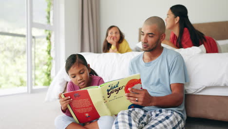 Father-reading-books-to-child-in-bedroom