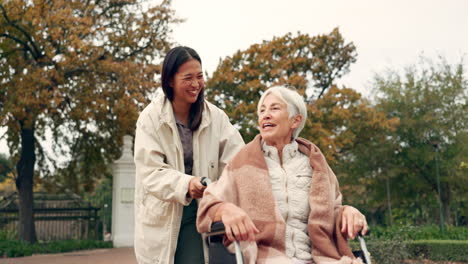 Elderly-woman,-wheelchair-and-nurse-in-park