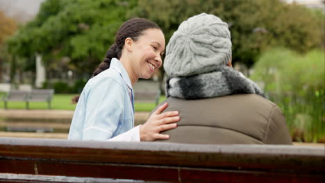 Nurse,-happy-and-support-with-old-woman-on-park