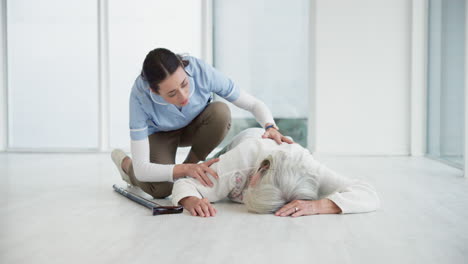 Accident,-help-and-nurse-with-old-woman-on-floor