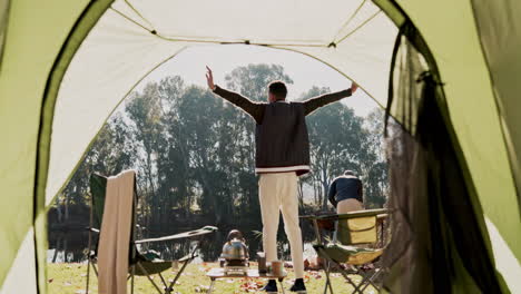 Nature,-camping-tent-and-man-stretching
