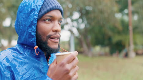 Camping,-morning-and-a-black-man-drinking-coffee