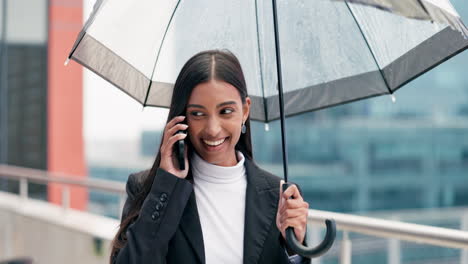 Phone-call,-umbrella-and-businesswoman-walking