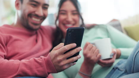Couple,-hands-and-relax-with-smartphone-in-home
