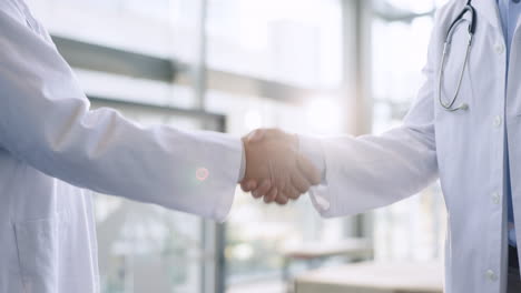 Hands,-teamwork-or-doctors-shaking-hands