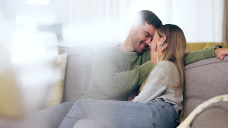 Man,-woman-and-love,-couple-on-sofa-with-trust