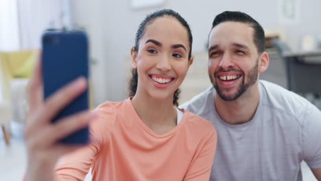 Selfie,-couple-and-home-with-laughing