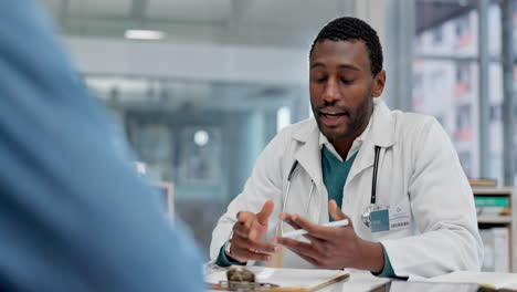 Black-man,-doctor-and-consulting-patient