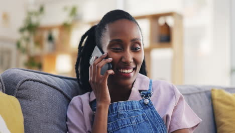 Funny,-phone-call-and-black-woman-talking-in-home