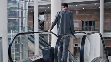 Business-man,-luggage-and-airport-escalator