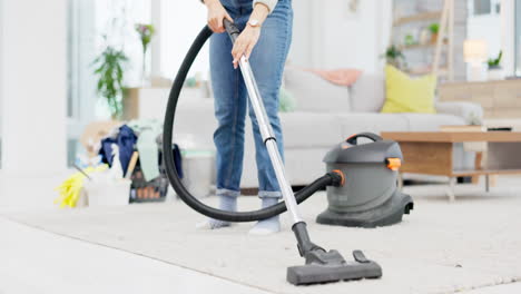 Person,-vacuum-and-cleaning-carpet-in-living-room