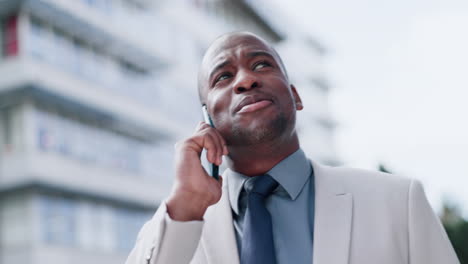 Black-man,-phone-call-and-city-in-business