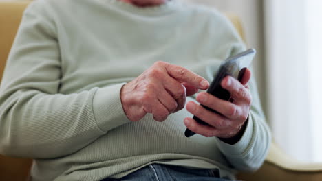 Parkinsons,-phone-and-hands-of-senior-man-typing