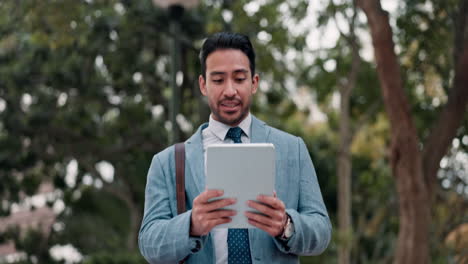 Video-call,-tablet-and-businessman-in-outdoor-park