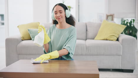 Housekeeping,-headphones-and-woman-cleaning