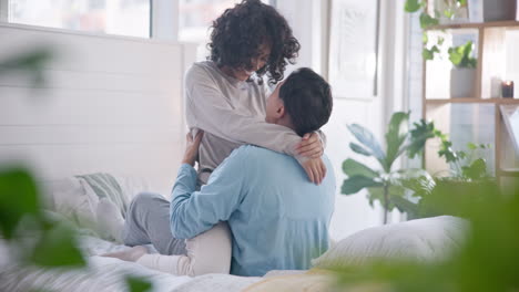 Hug,-home-bed-and-couple-kiss-with-love