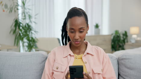 Relax,-wow-and-black-woman-with-phone-on-the-sofa