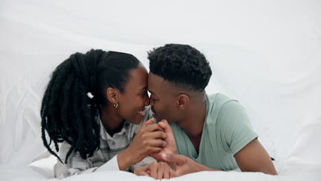 Black-couple,-bed-and-kiss-with-happy-love-under