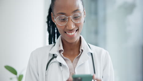 Woman,-doctor-and-smile-with-phone-for-typing