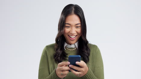Happy-asian-woman,-phone-and-winning
