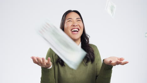 Winner,-money-and-excited-Asian-woman-on-a-white