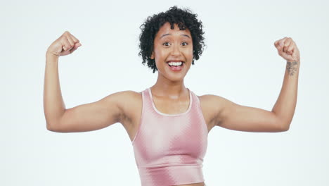 Fitness,-woman-face-and-arm-flex-in-studio