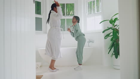 Play,-kid-or-mother-dancing-in-bathroom-grooming