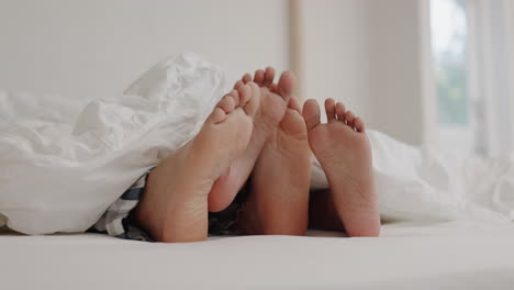 Closeup,-couple-and-bed-with-feet