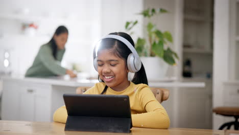 Tablet,-child-and-laugh-with-headphones-for-online