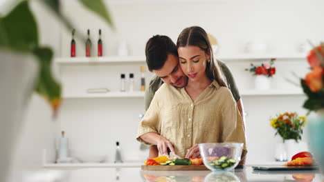 Ingredients,-kiss-and-couple-in-the-kitchen