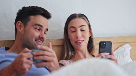 Couple,-coffee-and-phone-in-bed