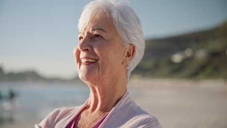 Old-woman,-smile-and-meditation-at-the-beach